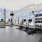 large windows surround rooftop fitness center